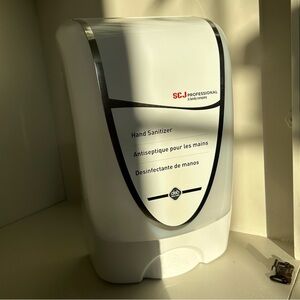 Free with a purchase in my closet Professional Hand Sanitizer Dispenser